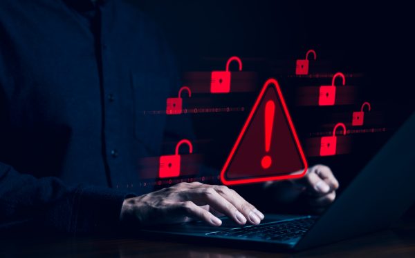cybersecurity concept. hacker working on computer. internet cyber crime, digital crime by anonymous hacker, system hacked alert cyberattack, compromised information, ransomware, phishing, spyware,