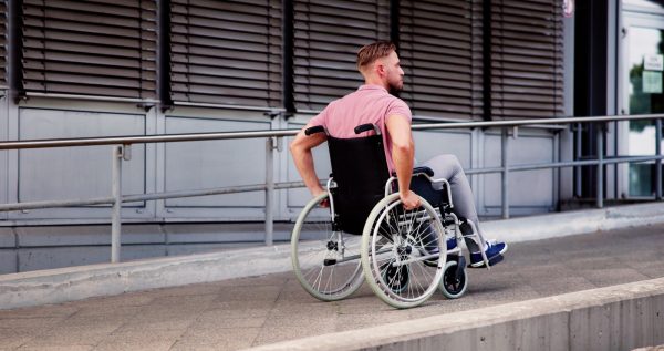 man with physical disability in wheel chair
