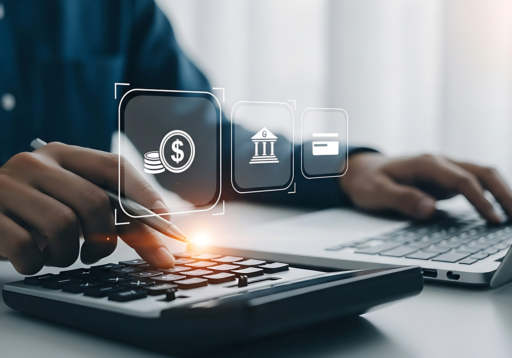 person using a calculator and laptop with currency, bank, and credit card digital icons, analyzing finances and managing banking online.