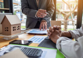 business meeting of real estate broker, business meeting working