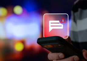 suspicious sms phishing warning message on smartphone, scam malware fraud risk and banking security alert for unsafe links and unauthorized access